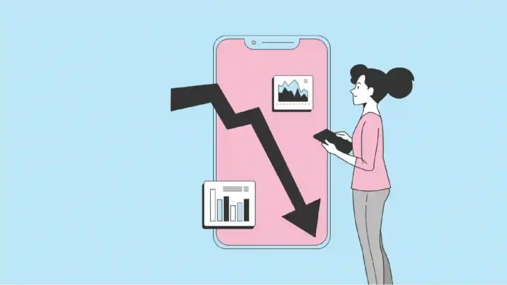 A woman looks at a large pink smartphone screen displaying charts and a bold downward arrow, symbolizing data decline and analysis.