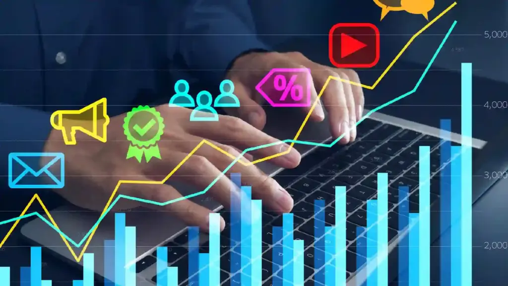 Hands typing on a laptop with colorful data charts and icons representing analytics and growth patterns