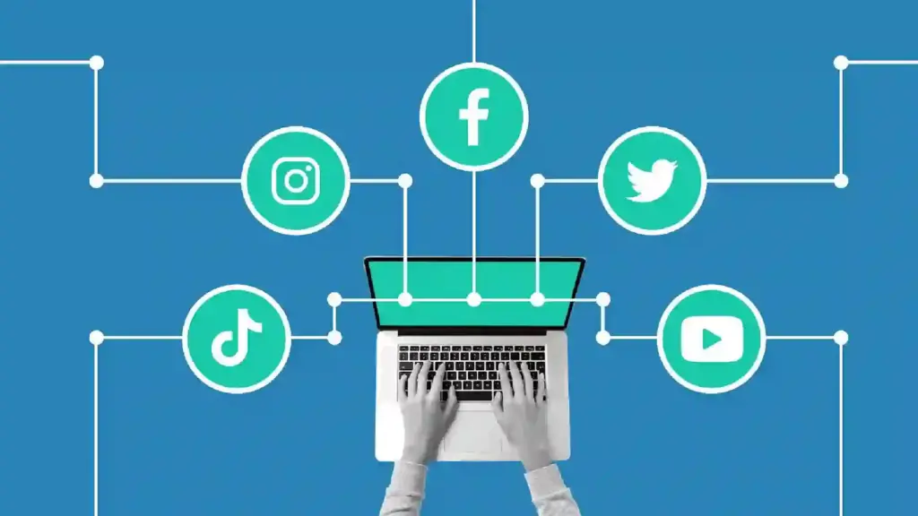 Hands typing on a laptop with white lines connecting social icons (Facebook, Instagram, Twitter, TikTok, YouTube) to represent connected social media channels and integration.