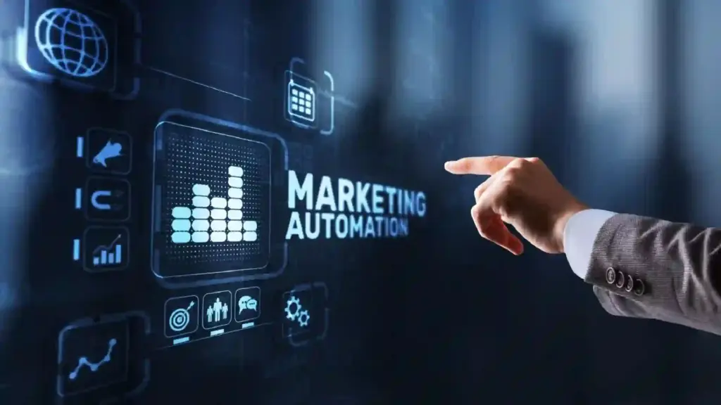 Hand in a suit points at a blue, futuristic marketing automation dashboard with charts and icons.